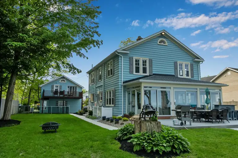 Beach House with Carriage house view from lake