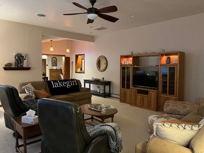 Living room area  - great space to enjoy a movie or a Buffalo Bills/Sabres Game