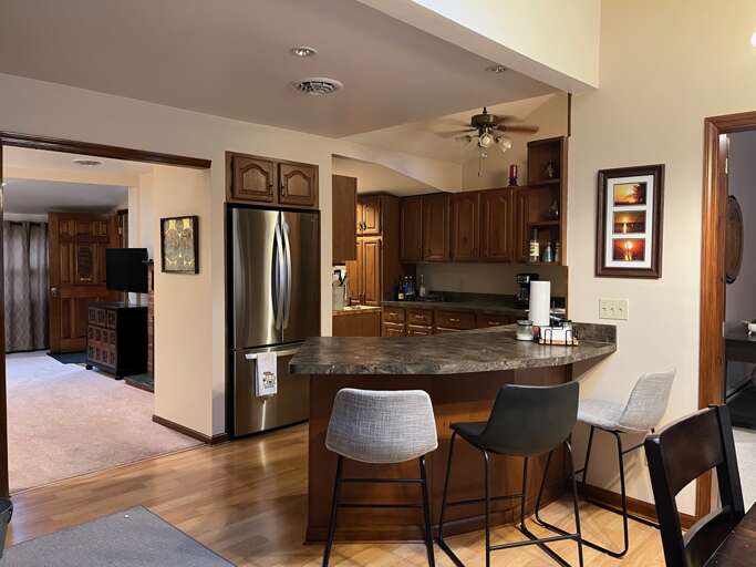 Kitchen area with bar seating